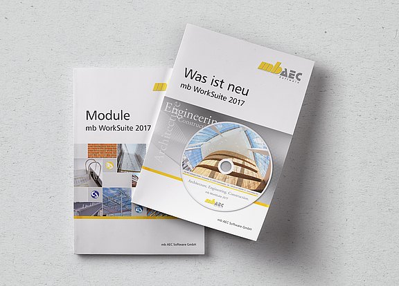 Die beiden Broschüren Was ist neu und Module zur mb WorkSuite 2017 von oben fotografiert auf einem hellgrauen Hintergrund.